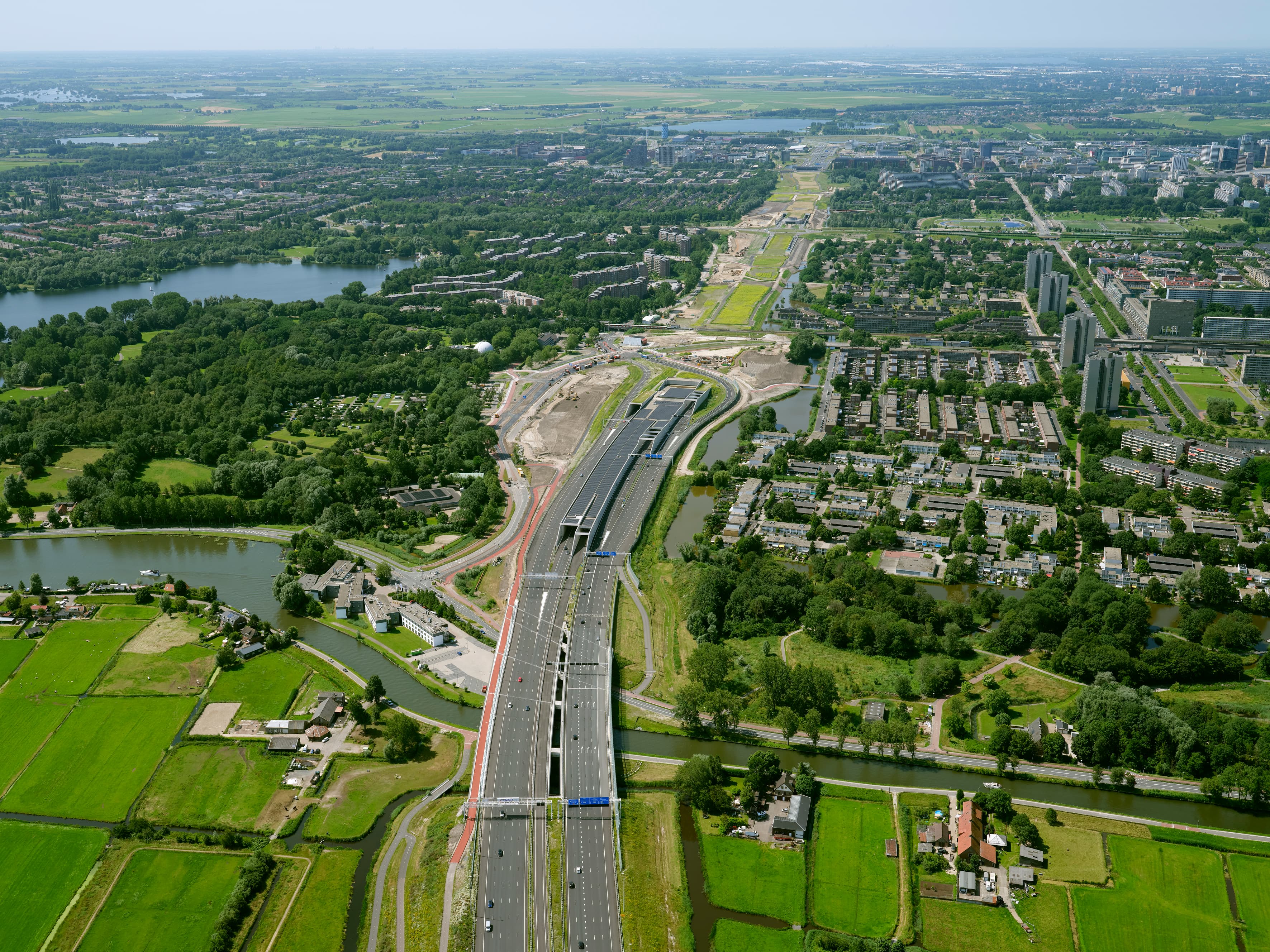 Aerial view of A9 highway project including a tunnel
